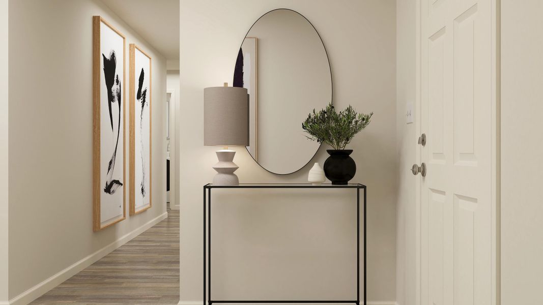 A room with a mirror and a plant on a table. A room with a mirror and a plant on a table.