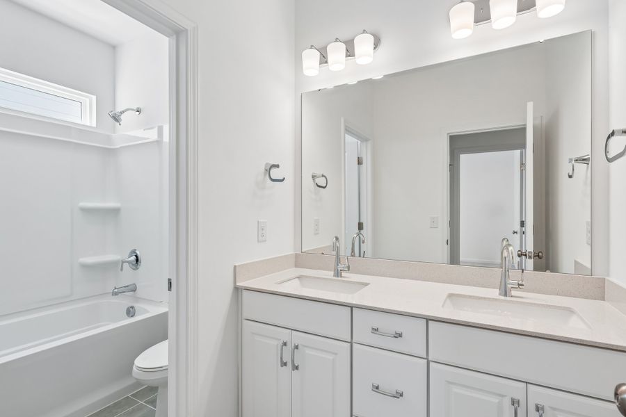 Furnished interior view inside a new home in Terraces at the Exchange, Indian Land (Image 10).