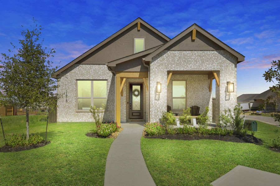 Front exterior of a new home in Riceland: 42ft. lots, Mont Belvieu, TX, highlighting curb appeal (Image 22).