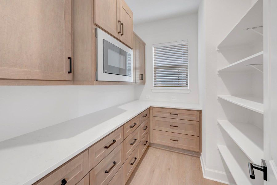 Furnished interior view inside a new home in ARTAVIA 65' Homesites, Conroe (Image 6).