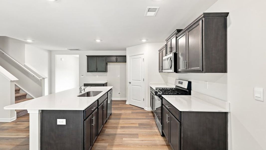 Furnished interior view inside a new home in Bentley Park, Greenwood (Image 9).
