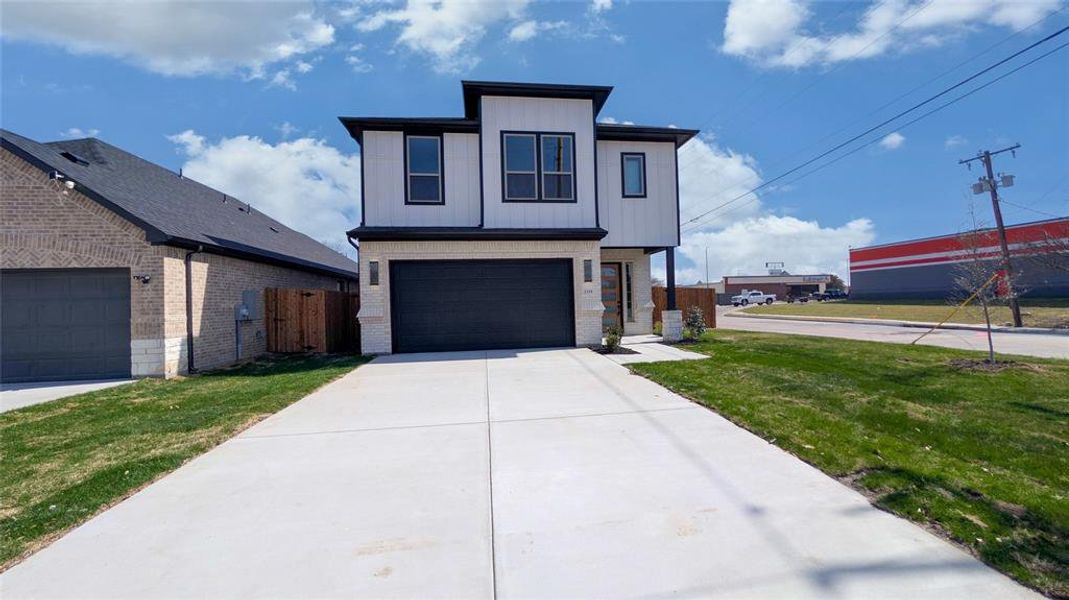 Front exterior of a new home in , Grand Prairie, TX, highlighting curb appeal (Image 2). Front exterior of a new home in , Grand Prairie, TX, highlighting curb appeal (Image 2).