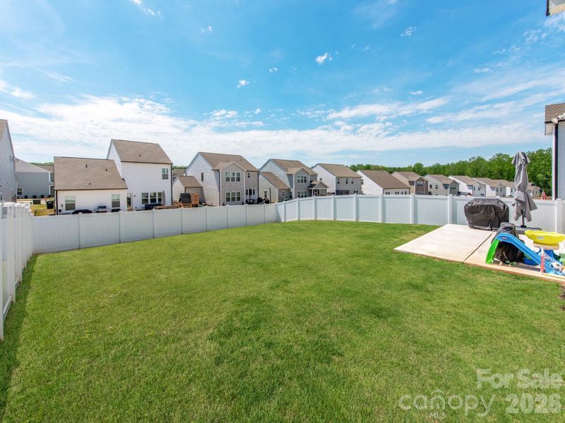 Exterior details and patio area of a home in Sutter's Mill II, Troutman (Image 3).