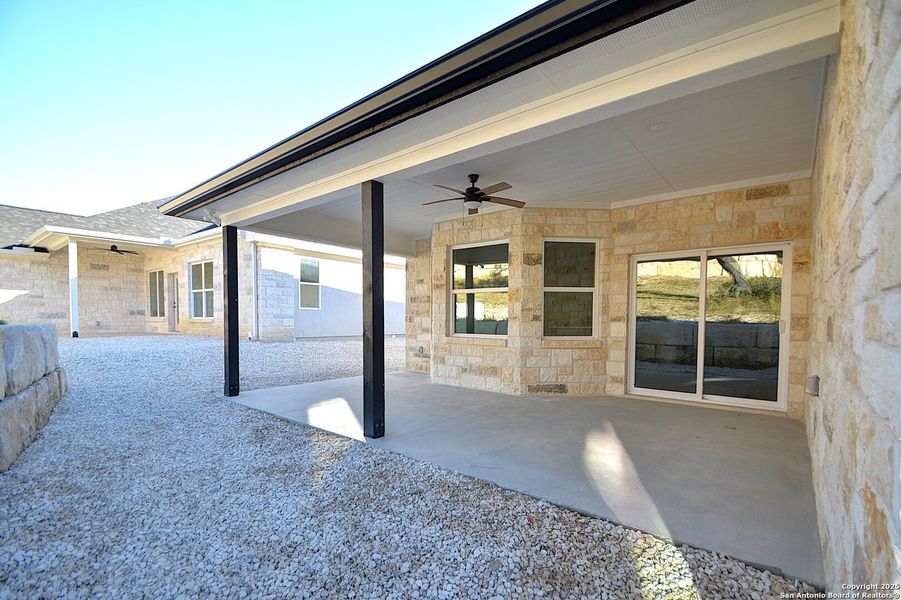 Exterior details and patio area of a home in , Kerrville (Image 19).