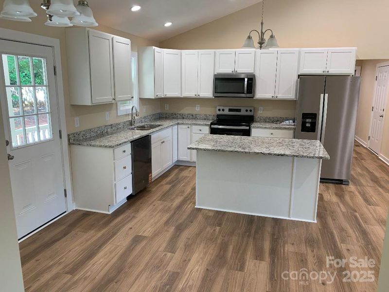 Furnished interior view inside a new home in , Statesville (Image 3).