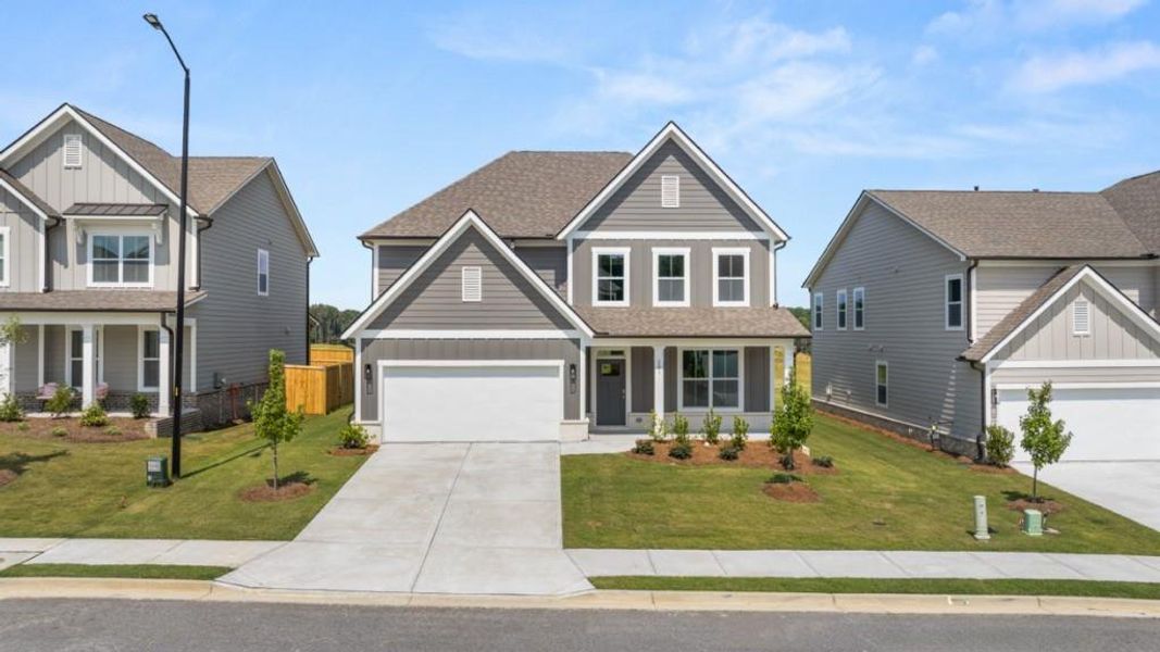 Front exterior of a new home in Hamptons at Riverwood East, Dallas, GA, highlighting curb appeal (Image 2). Front exterior of a new home in Hamptons at Riverwood East, Dallas, GA, highlighting curb appeal (Image 2).