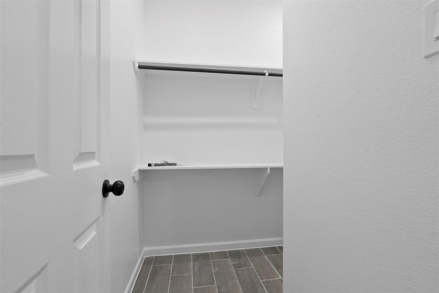 Primary closet - walk around for full view to the right Primary closet - walk around for full view to the right