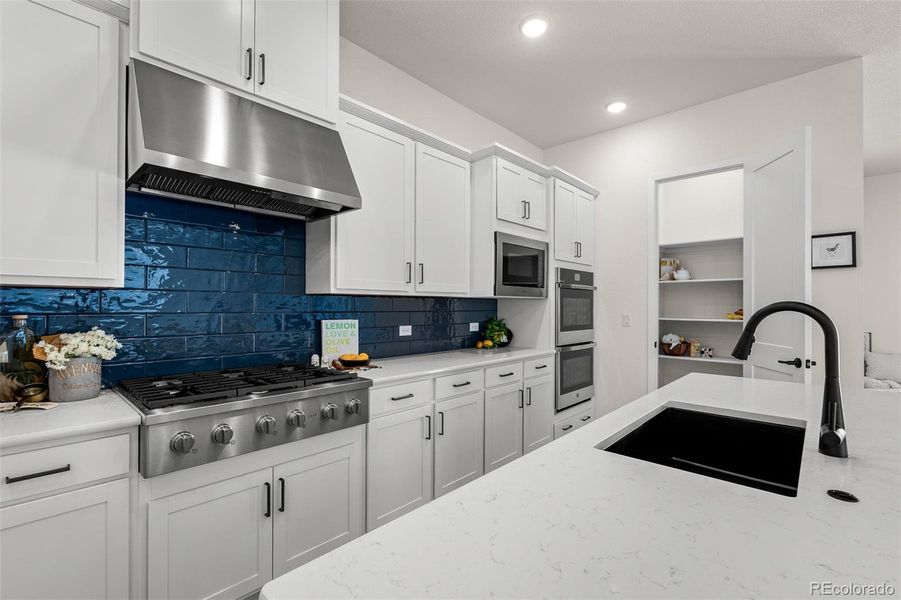Furnished interior view inside a new home in Wolf Ranch - Enclave Collection, Colorado Springs (Image 25).