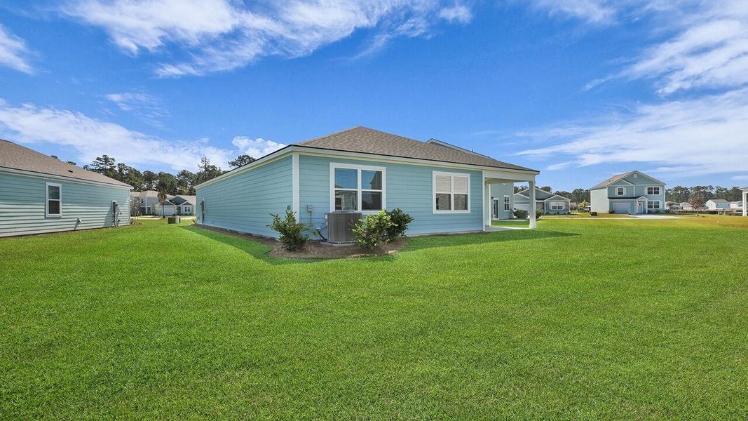 Exterior details and patio area of a home in Hillcrest, Ravenel (Image 22).