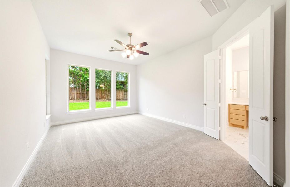 Spacious, unfurnished interior of a new home in The Woodlands Hills 65′, Willis (Image 25).