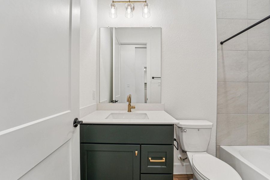 Furnished interior view inside a new home in Evergreen, Conroe (Image 14).