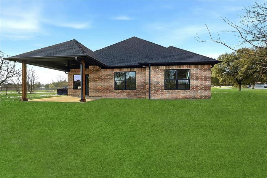 Back of house with a patio area, ceiling fan, a shingled roof, and brick siding Back of house with a patio area, ceiling fan, a shingled roof, and brick siding