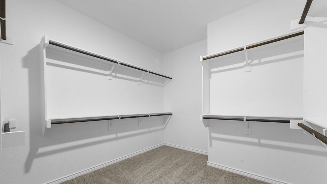 Representative unfurnished interior of a home built from the Bastrop by D.R. Horton in Woodcreek, Fate (Image 8).