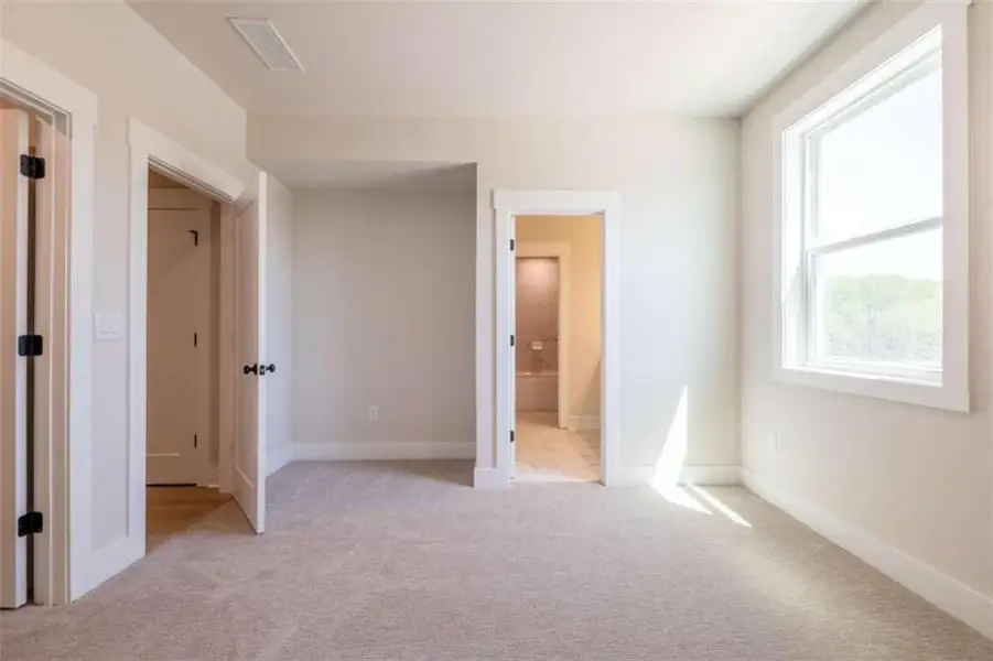 Spacious, unfurnished interior of a new home in The Paddocks at Doc Hughes, Buford (Image 27). Spacious, unfurnished interior of a new home in The Paddocks at Doc Hughes, Buford (Image 27).