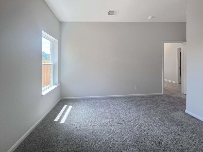 Secondary Bedroom. Home under construction. Sample floor plan photo used for illustrative purposes only. Upgrades, selections options, windows and colors may vary.