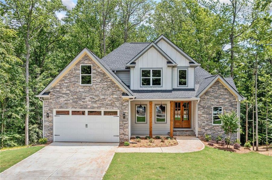 Front exterior of a new home in , Canton, GA, highlighting curb appeal (Image 24).
