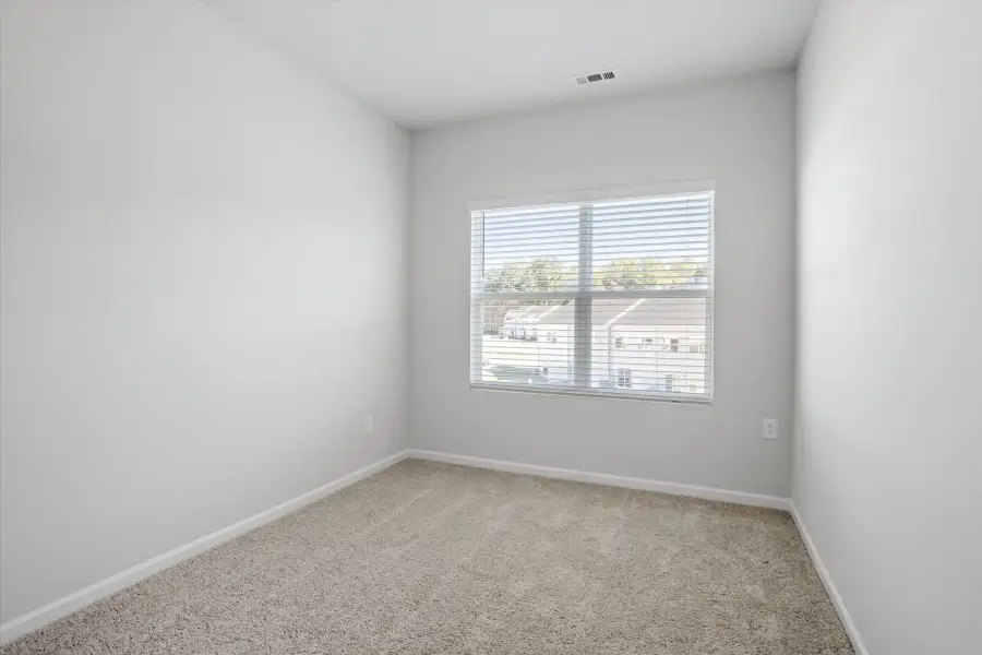 Spacious, unfurnished interior of a new home in West Main Townhomes, Sanford (Image 25). Spacious, unfurnished interior of a new home in West Main Townhomes, Sanford (Image 25).