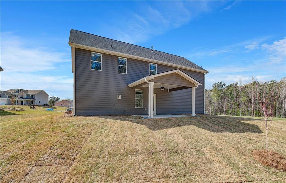Front exterior of a new home in Copperfield, Locust Grove, GA, highlighting curb appeal (Image 16).