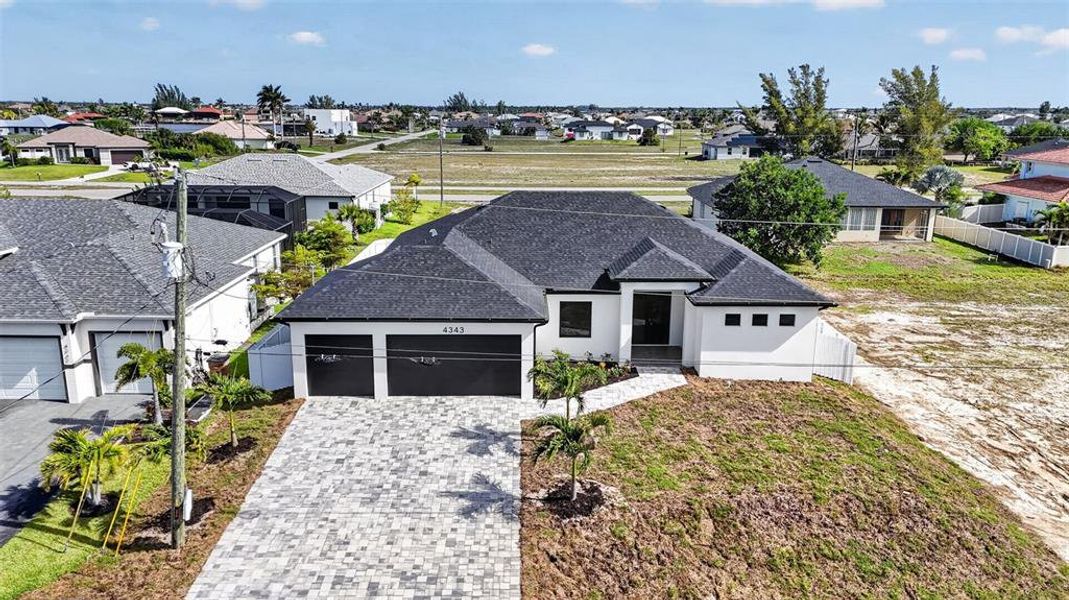 Front exterior of a new home in , Cape Coral, FL, highlighting curb appeal (Image 27).