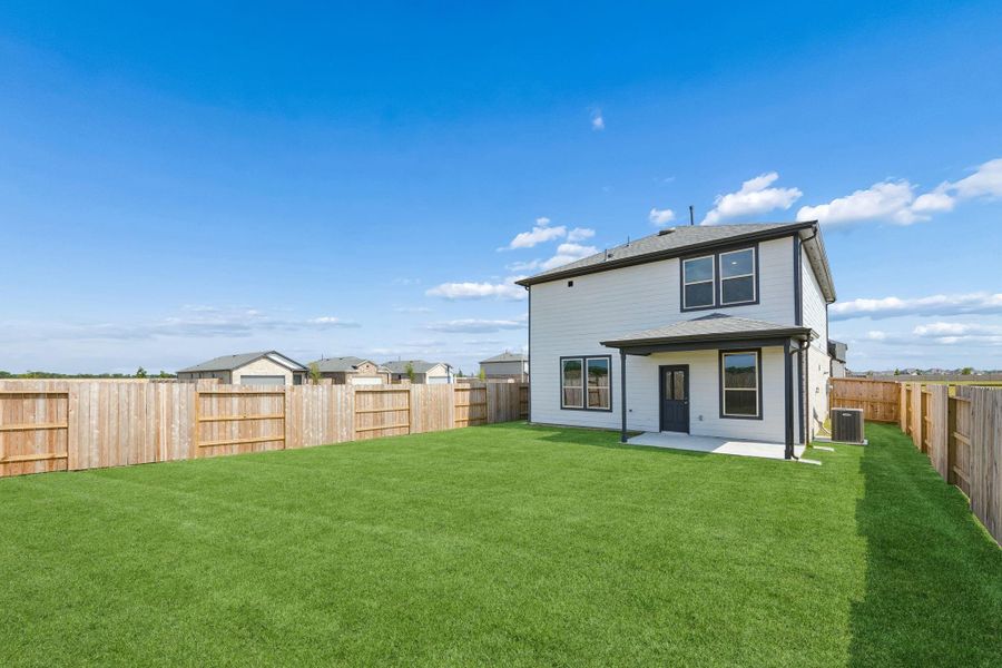 Exterior details and patio area of a home in River Ranch, Dayton (Image 4).