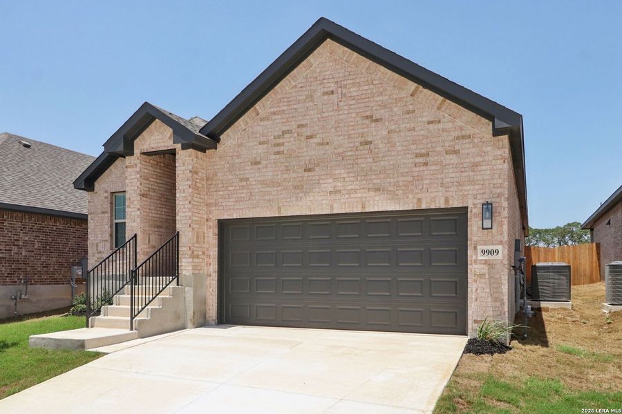 Front exterior of a new home in Kallison Ranch, San Antonio, TX, highlighting curb appeal (Image 23).