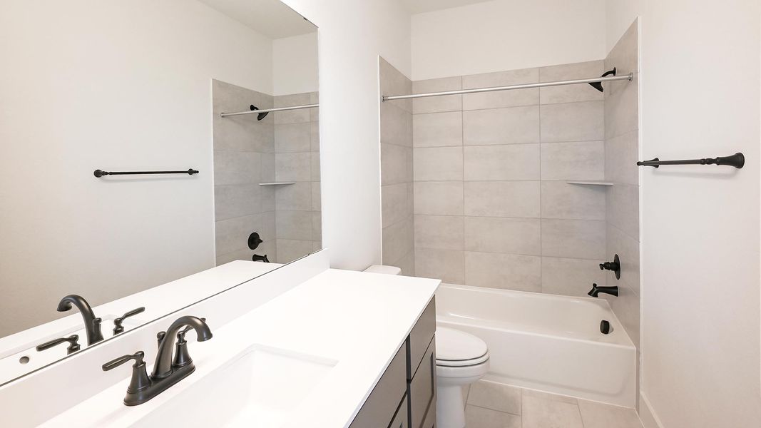 Furnished interior view inside a new home in Crosswinds 50', Kyle (Image 8).