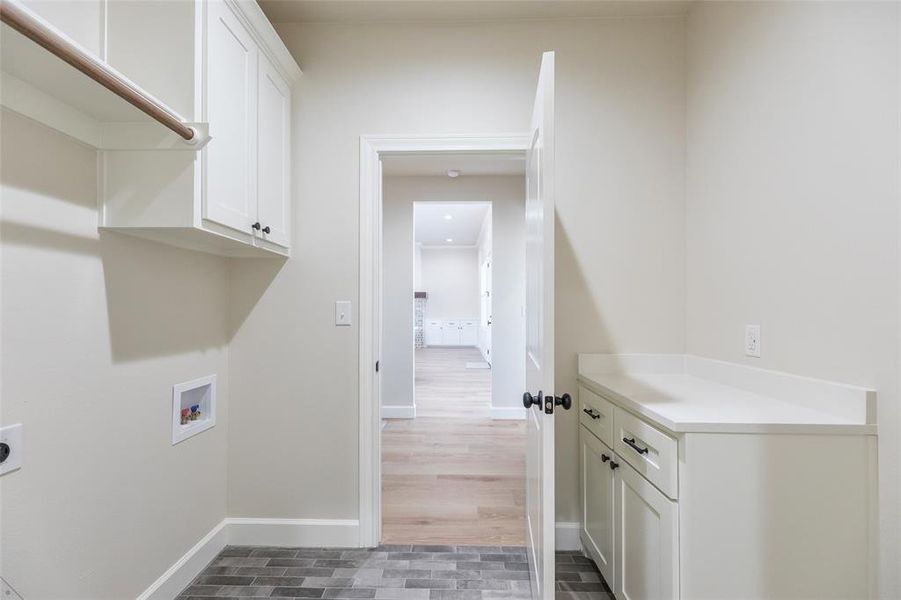 Leading into Primary Bedroom's closet