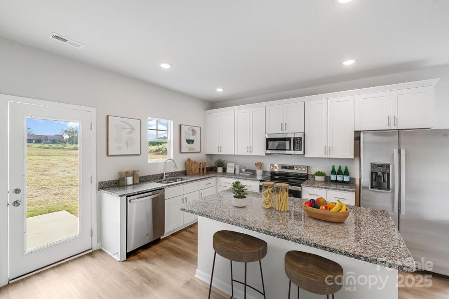 Furnished interior view inside a new home in , Statesville (Image 7).