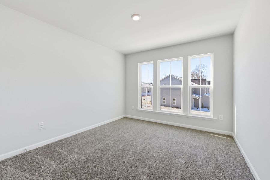 Spacious, unfurnished interior of a new home in Poets Walk, Whitsett (Image 47).