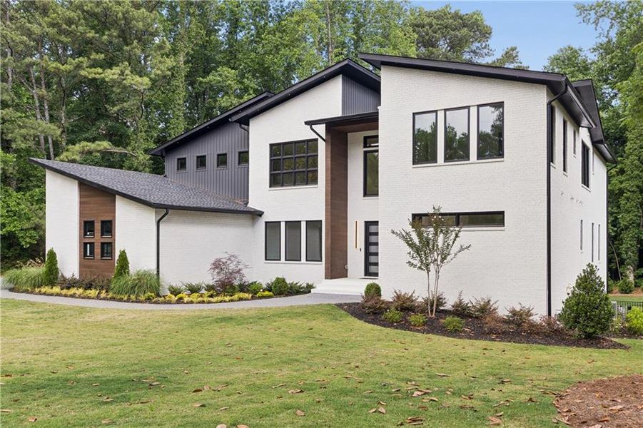 Front exterior of a new home in , Sandy Springs, GA, highlighting curb appeal (Image 27).