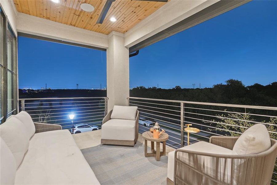 Balcony featuring an outdoor hangout area Balcony featuring an outdoor hangout area