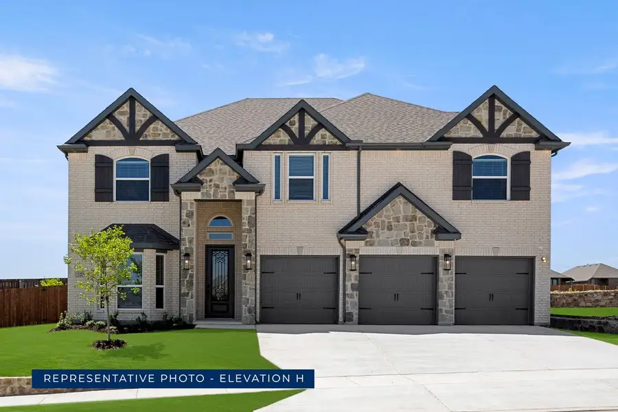Representative exterior photo of a completed home built from the Boston 2F (w/Media) by First Texas Homes in Spiritas Ranch, Little Elm, TX (Image 15).
