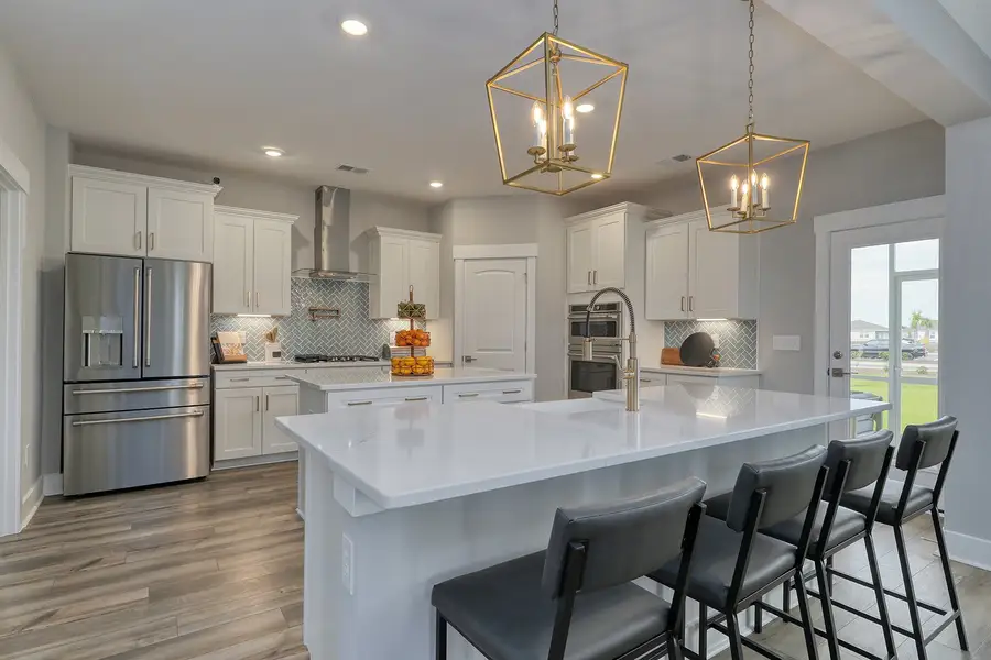 Representative furnished interior of a home built from the Warwick II - Vanguard Collection by Mungo Homes in Sweetbrier, Durham (Image 6).