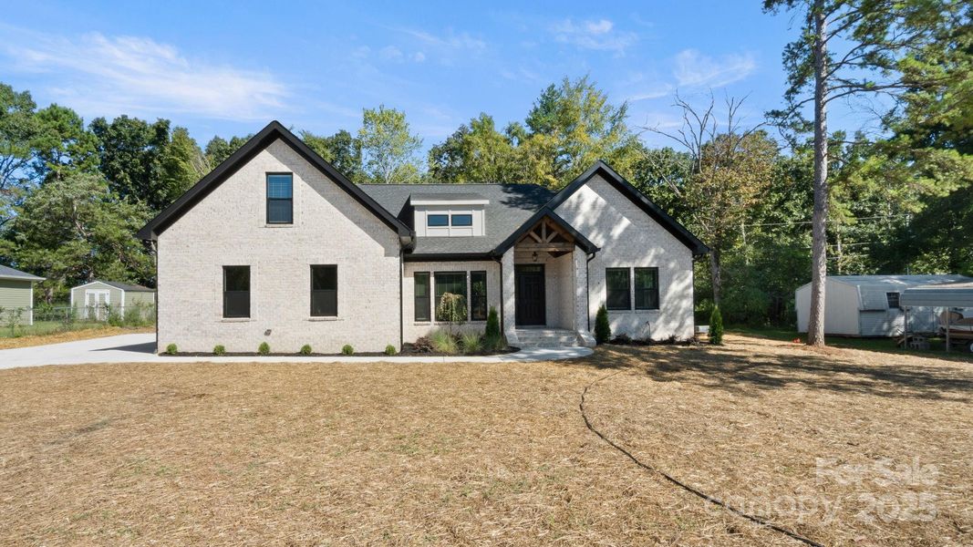 Front exterior of a new home in , Indian Trail, NC, highlighting curb appeal (Image 27). Front exterior of a new home in , Indian Trail, NC, highlighting curb appeal (Image 27).