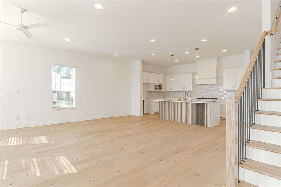 Open living to family and dining, hardwoods