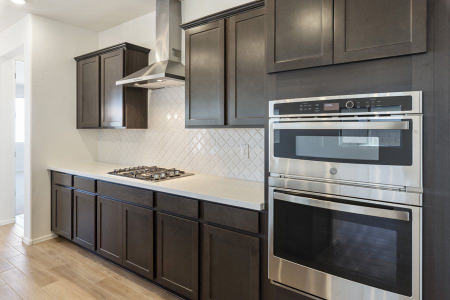 Furnished interior view inside a new home in Windrose V, Waddell (Image 6).