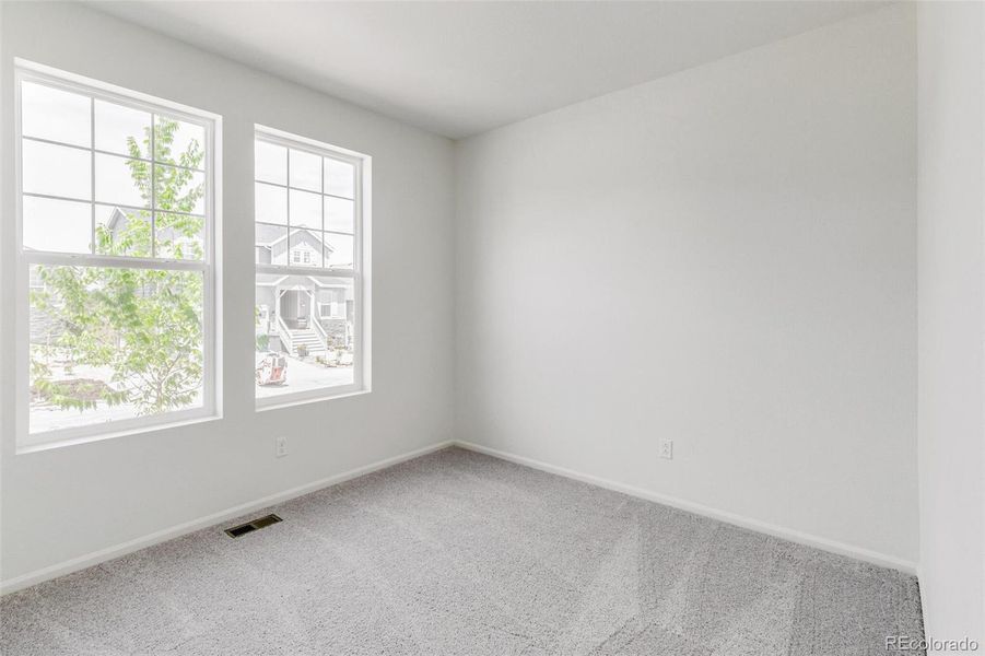 Spacious, unfurnished interior of a new home in Terrain Oak Valley, Castle Rock (Image 26).