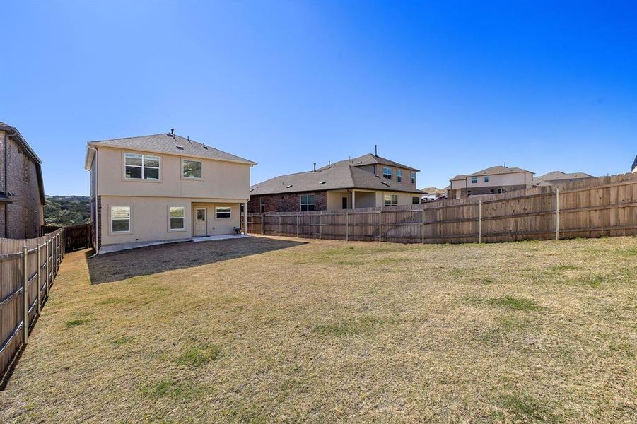 Backyard with covered sitting area