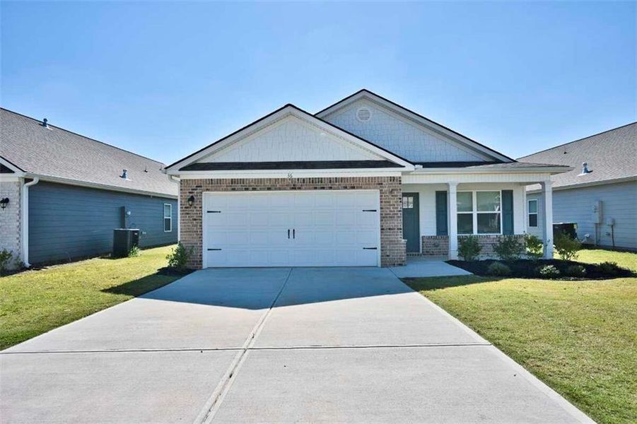 Front exterior of a new home in , Winder, GA, highlighting curb appeal (Image 1). Front exterior of a new home in , Winder, GA, highlighting curb appeal (Image 1).
