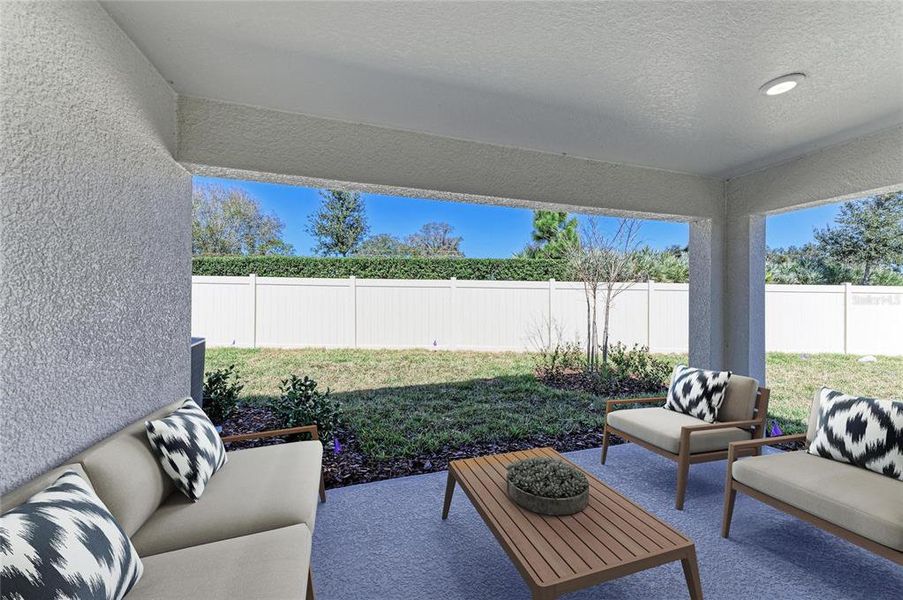 Exterior details and patio area of a home in Crosswind Point, Parrish (Image 2).