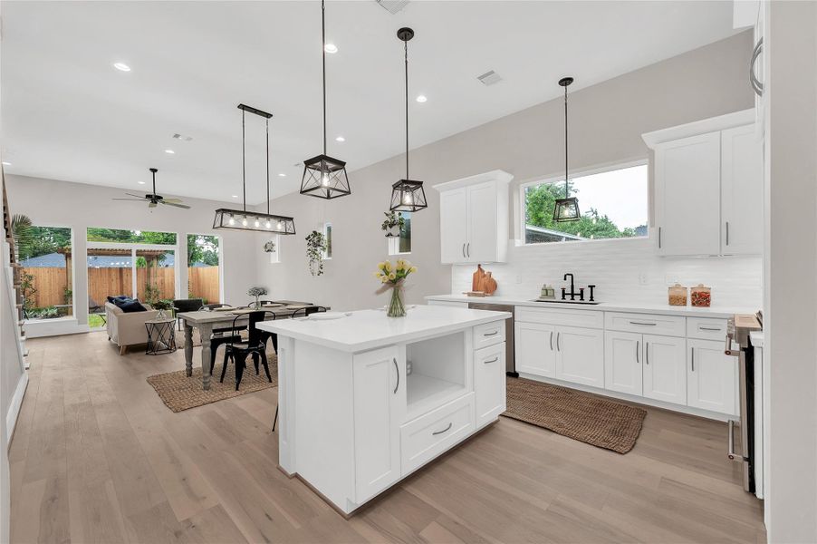 Large island with space below for a microwave