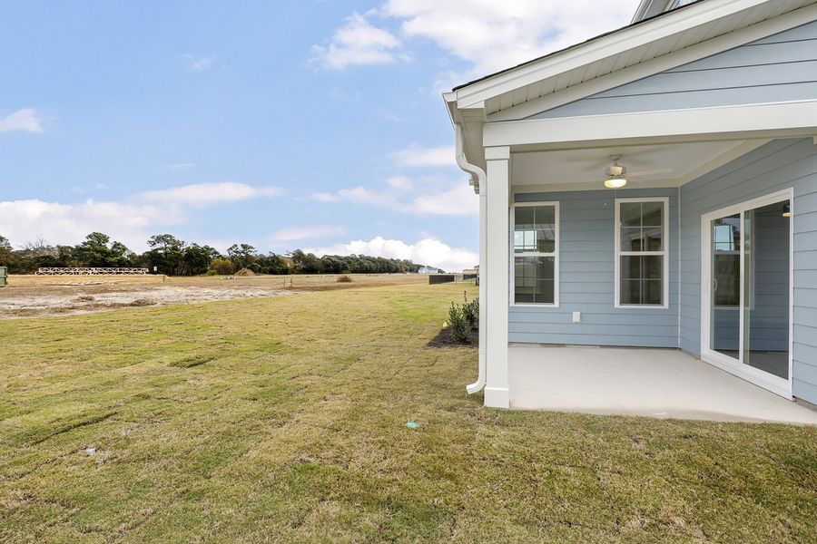Exterior details and patio area of a home in East Wynd, Hampstead (Image 3).