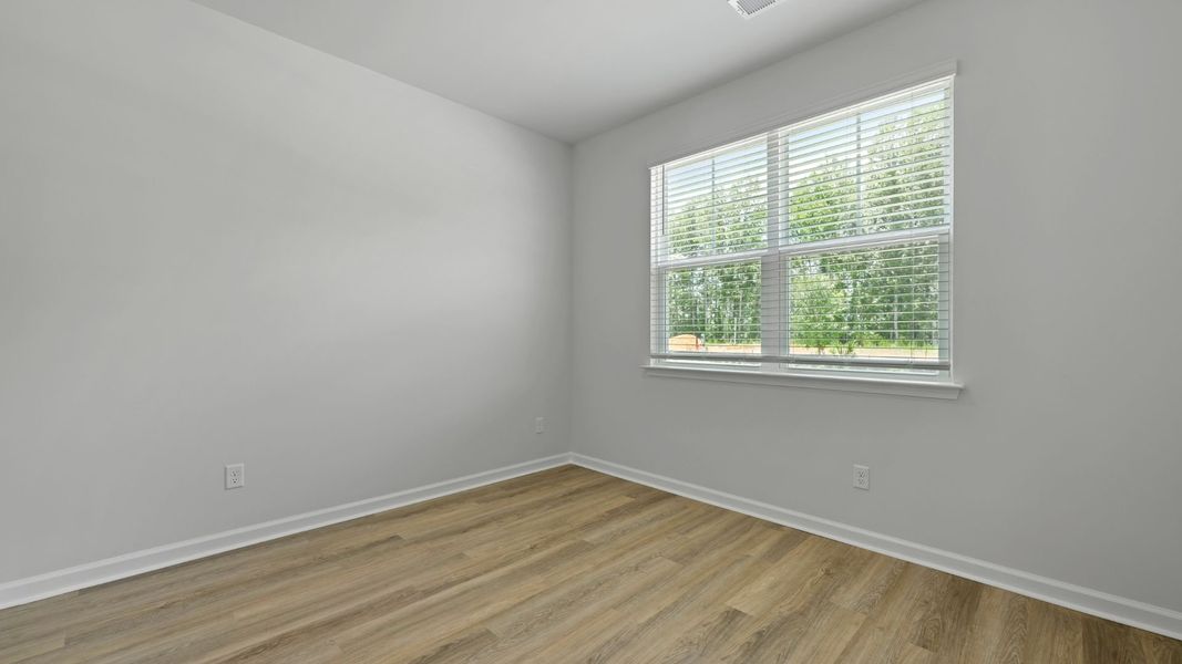 Spacious, unfurnished interior of a new home in Pineview North, Summerville (Image 12).