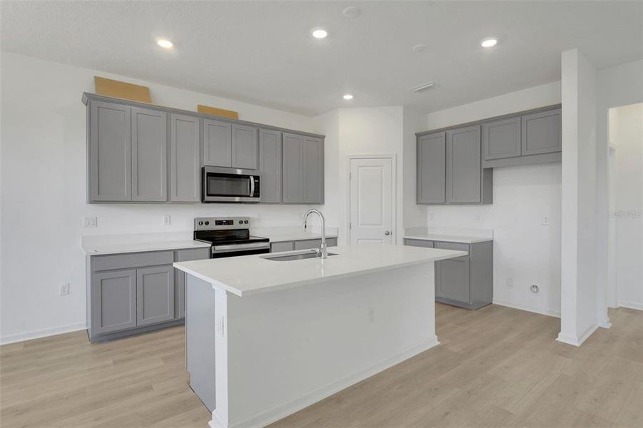 Furnished interior view inside a new home in Willowbrook North, Winter Haven (Image 9).