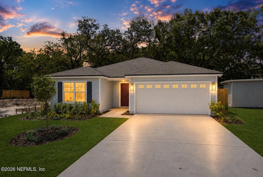 Front exterior of a new home in , Jacksonville, FL, highlighting curb appeal (Image 1). Front exterior of a new home in , Jacksonville, FL, highlighting curb appeal (Image 1).