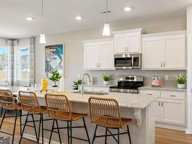 Furnished interior view inside a new home in Ivy Glen, Perry (Image 5).