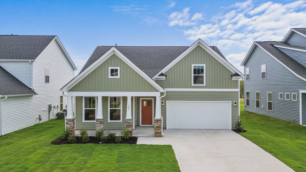 Representative exterior photo of a completed home built from the Parker by DRB Homes in Hinson Farm, Fountain Inn, SC (Image 2). Representative exterior photo of a completed home built from the Parker by DRB Homes in Hinson Farm, Fountain Inn, SC (Image 2).