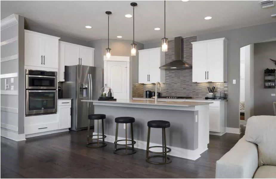 Photo of Pulte model home with same floor plan, not of actual home listed.