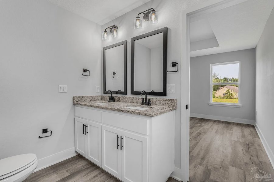 Furnished interior view inside a new home in Allison Acres, Cantonment (Image 11).