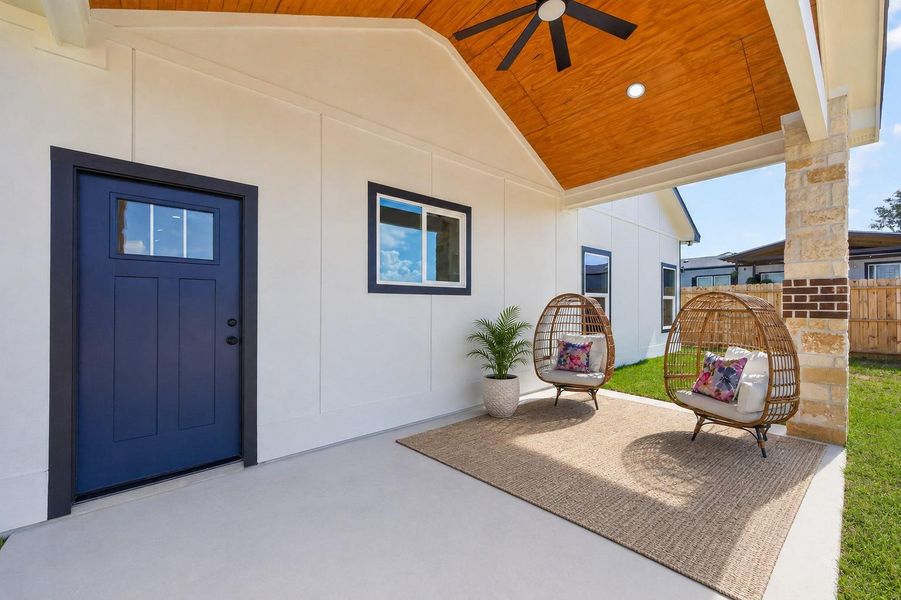 Oversized covered patio featuring a custom ceiling and ample space for outdoor entertaining. Oversized covered patio featuring a custom ceiling and ample space for outdoor entertaining.